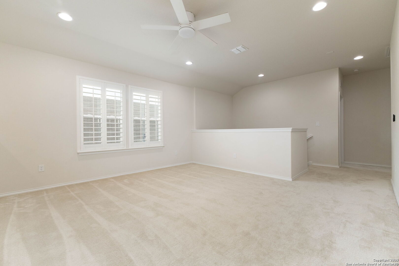 353 Aberdeen Boerne, TX 78015 - Photo 22 of 36 an empty room with windows