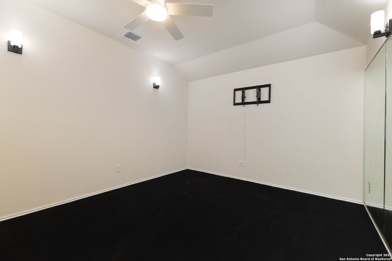 353 Aberdeen Boerne, TX 78015 - Photo 23 of 36 an empty room with a wooden floor and a window