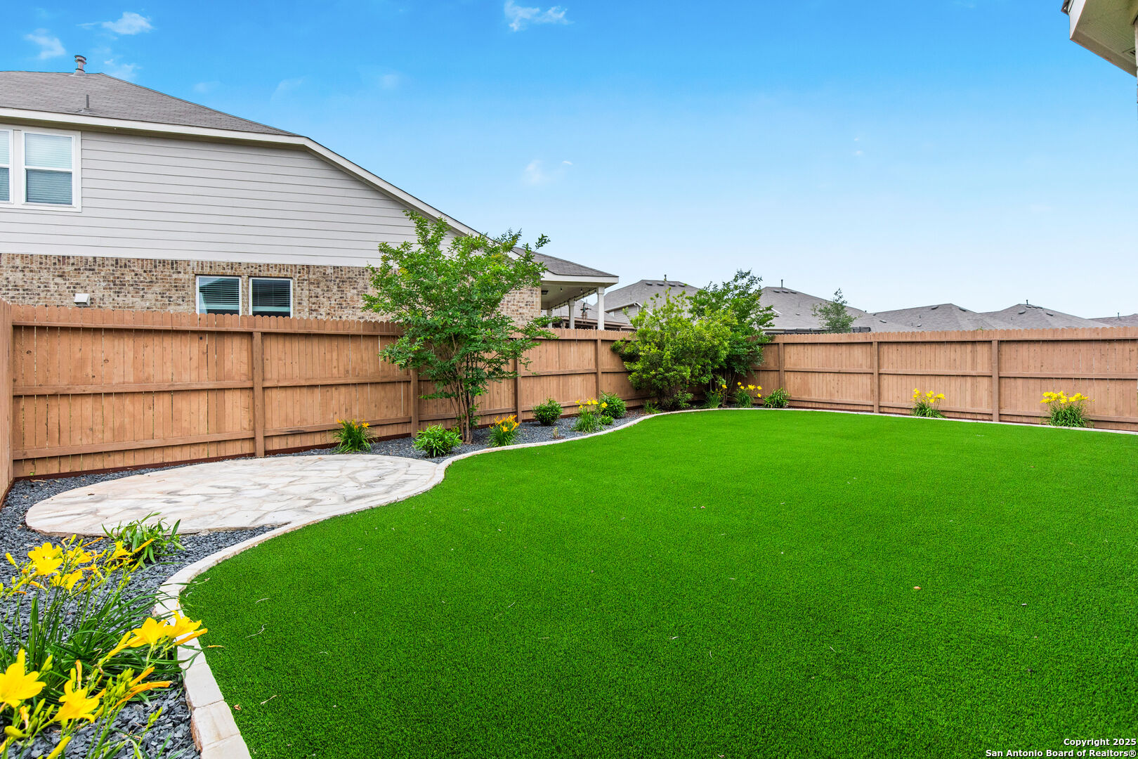 353 Aberdeen Boerne, TX 78015 - Photo 30 of 36 a front view of a house with a garden and yard