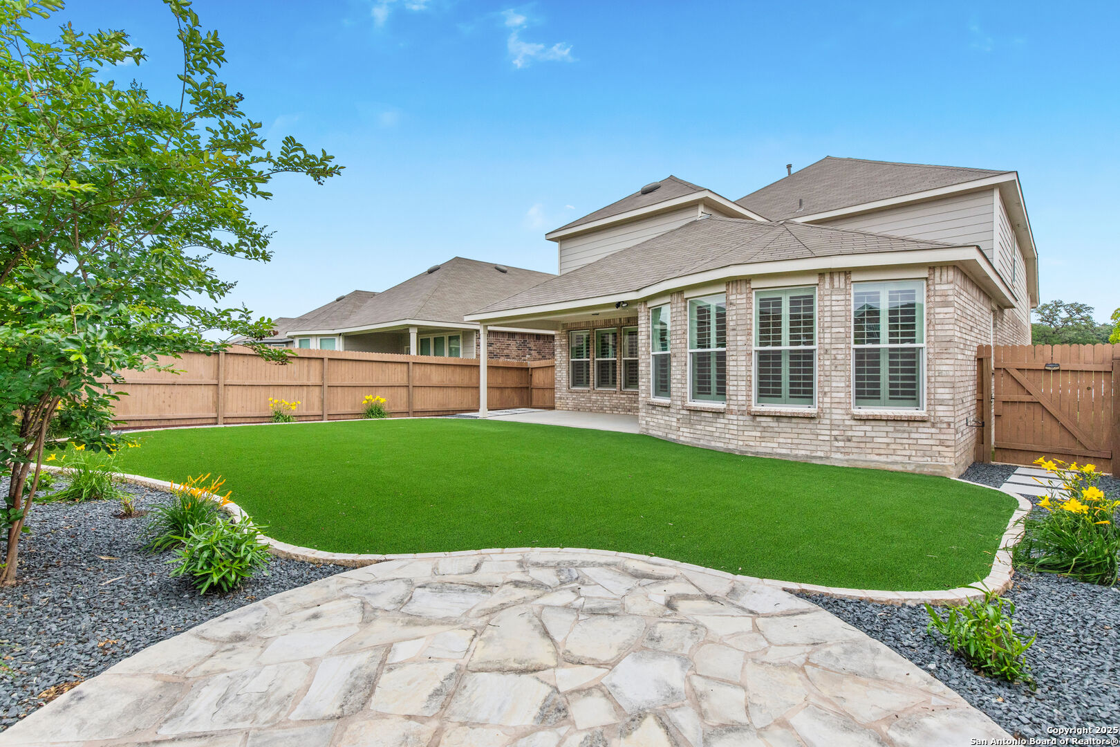 353 Aberdeen Boerne, TX 78015 - Photo 33 of 36 a view of a house with a garden