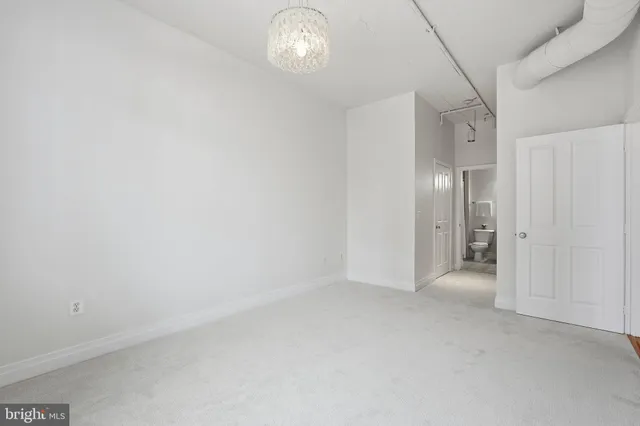 a picture of a bench in front of a door