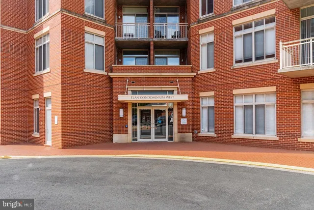 a kitchen with stainless steel appliances a stove sink and cabinets