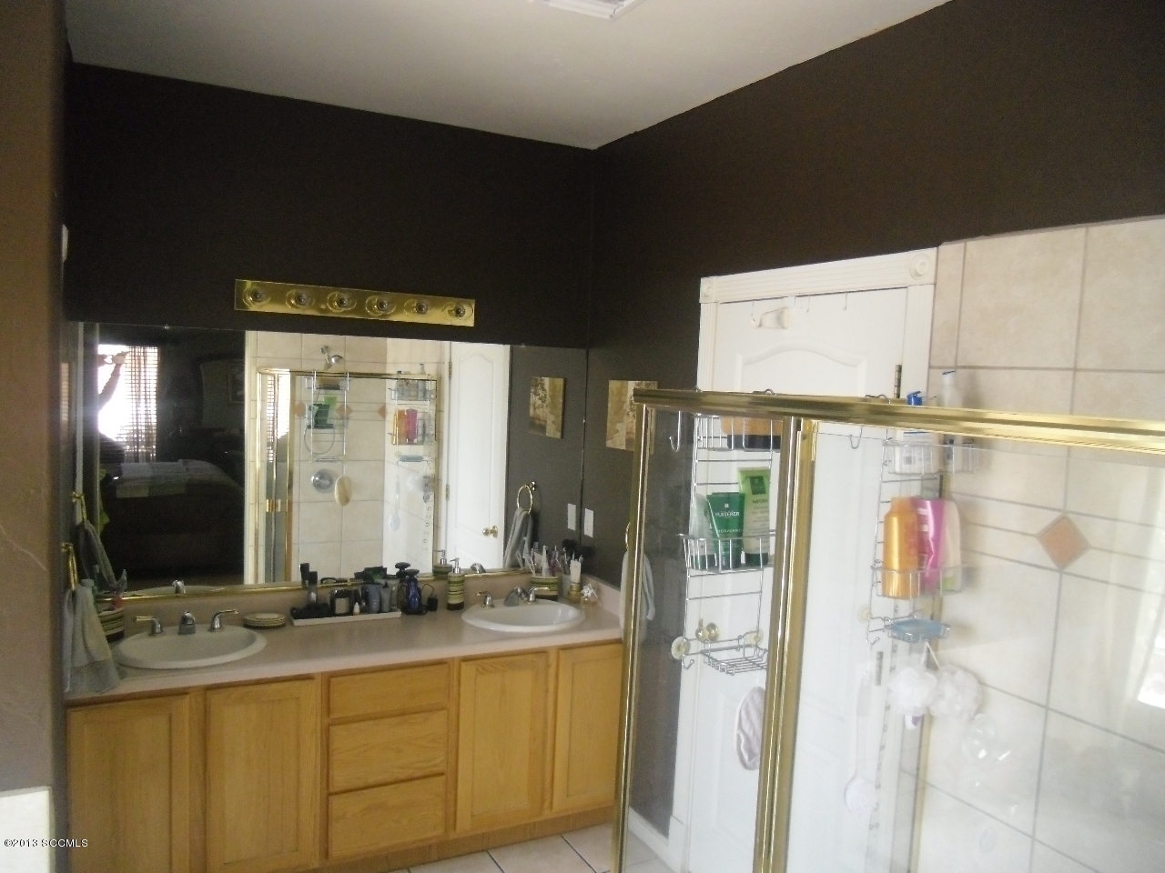 39 Camino Pesqueira Rio Rico, AZ 85648 - Photo 23 of 29 a bathroom with double vanity and a mirror