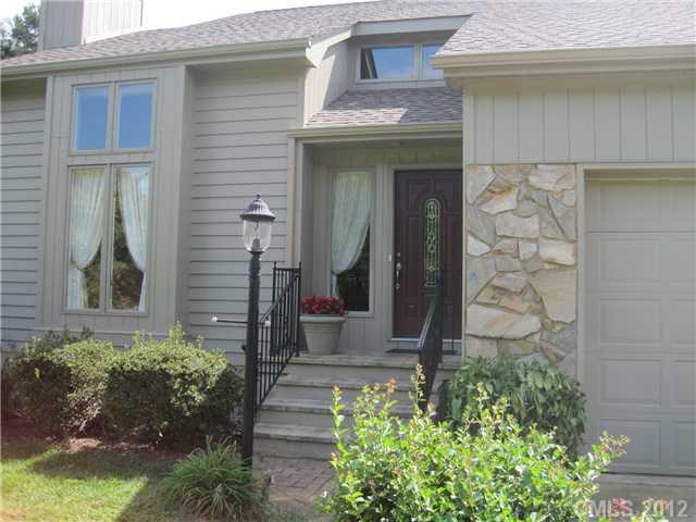 272 Spring Run Road Mooresville, NC 28117 - Photo 2 of 16 a front view of a house with a glass windows