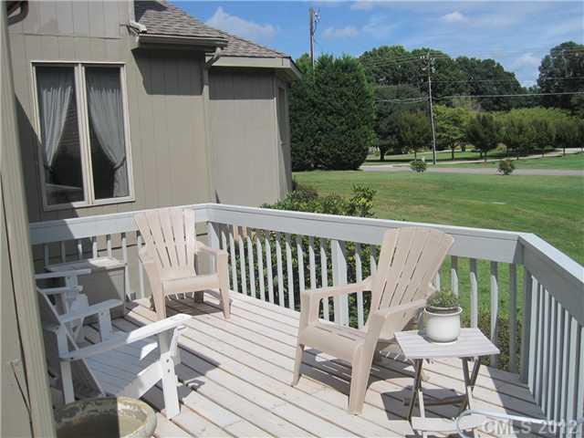 272 Spring Run Road Mooresville, NC 28117 - Photo 14 of 16 a view of a chair and tables front of the house