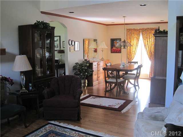 272 Spring Run Road Mooresville, NC 28117 - Photo 3 of 16 a living room with furniture and wooden floor