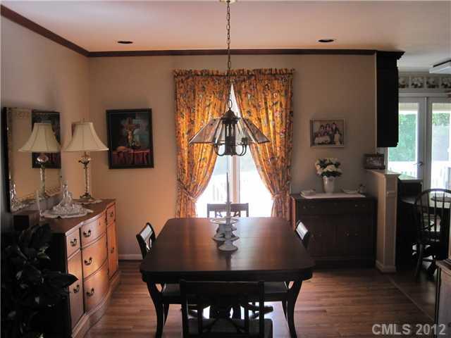 272 Spring Run Road Mooresville, NC 28117 - Photo 5 of 16 a view of a dining room with furniture and window