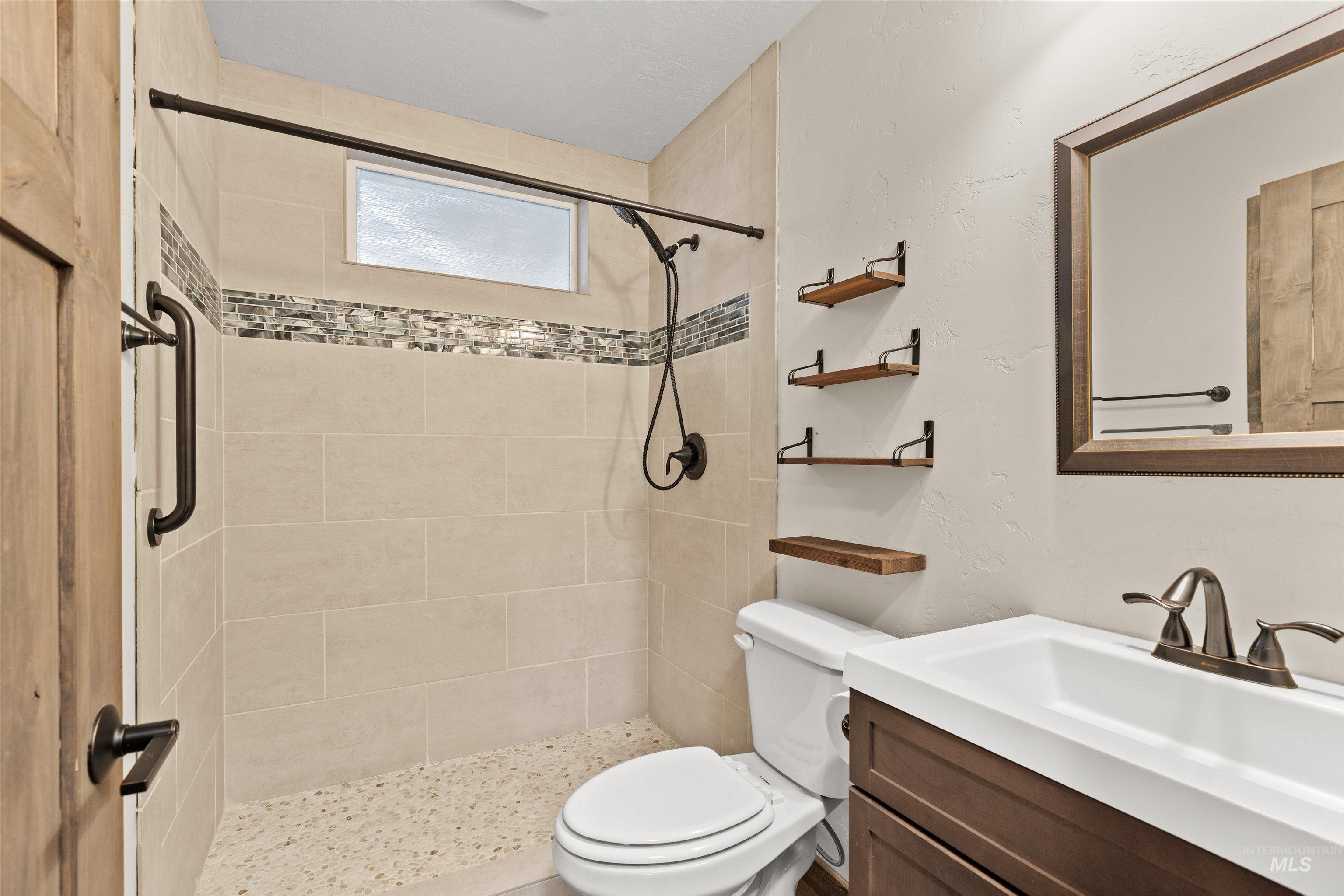 3488 Ward Road Cambridge, ID 83610 - Photo 29 of 50 Full bath with vanity and a stall shower