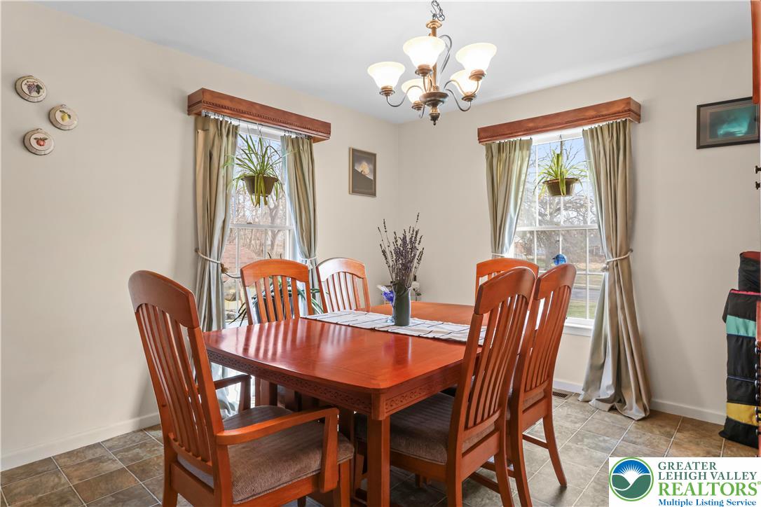 1712 9th Street Bethlehem, PA 18020 - Photo 14 of 38 a view of a dining room with furniture and chandelier