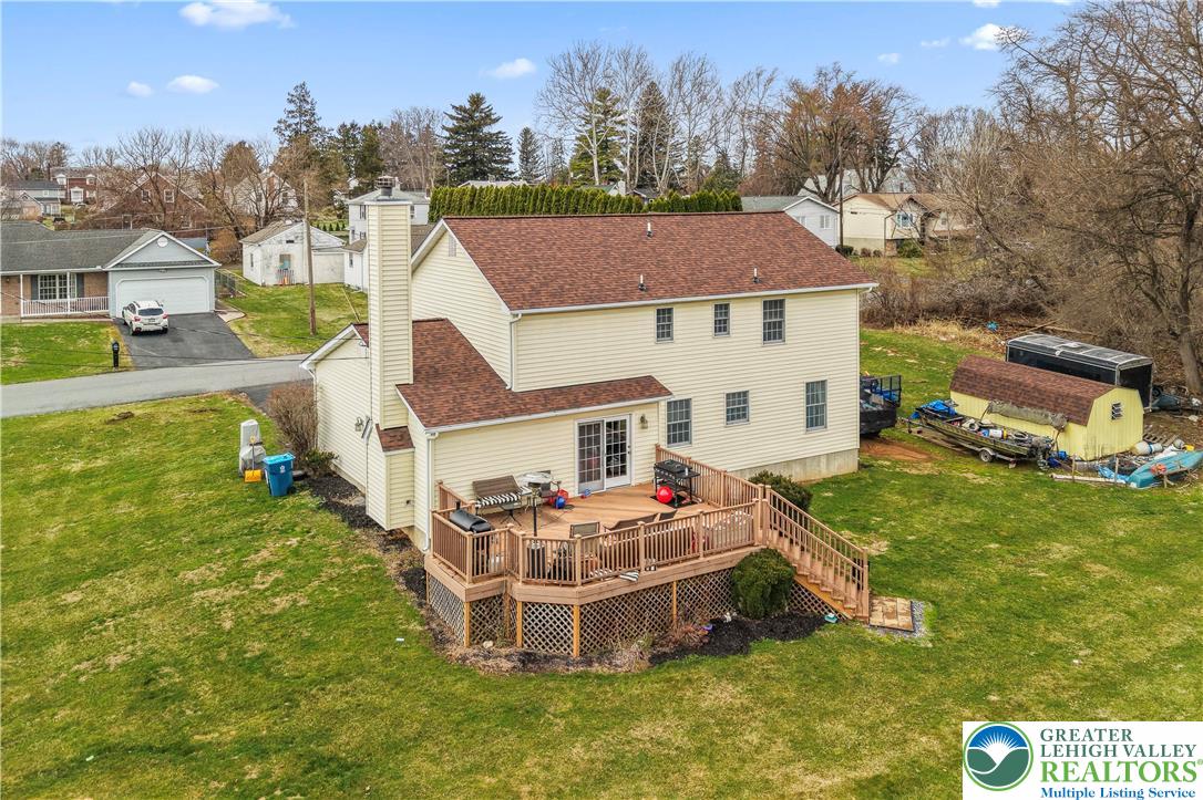 1712 9th Street Bethlehem, PA 18020 - Photo 2 of 38 a view of a house with a big yard and large trees