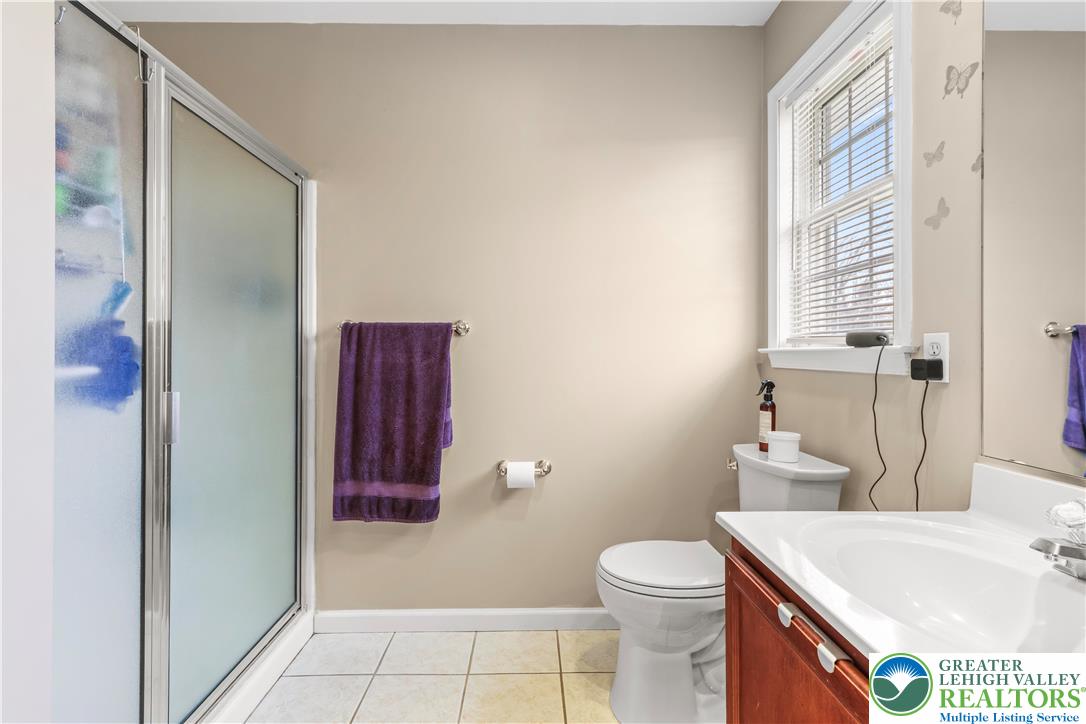 1712 9th Street Bethlehem, PA 18020 - Photo 22 of 38 a bathroom with a sink a toilet and shower