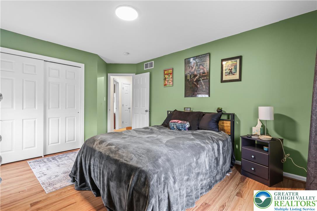 1712 9th Street Bethlehem, PA 18020 - Photo 23 of 38 a bed room with a bed and a television