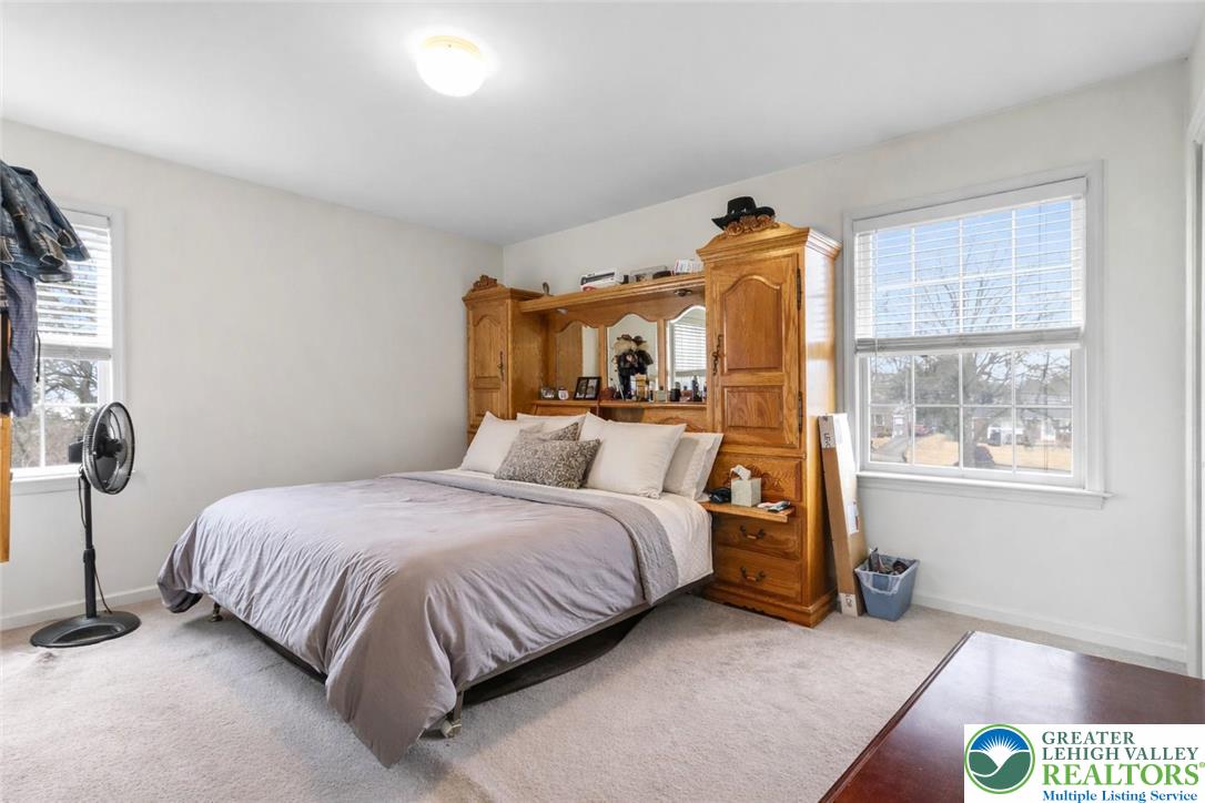 1712 9th Street Bethlehem, PA 18020 - Photo 26 of 38 a spacious bedroom with a bed and a window