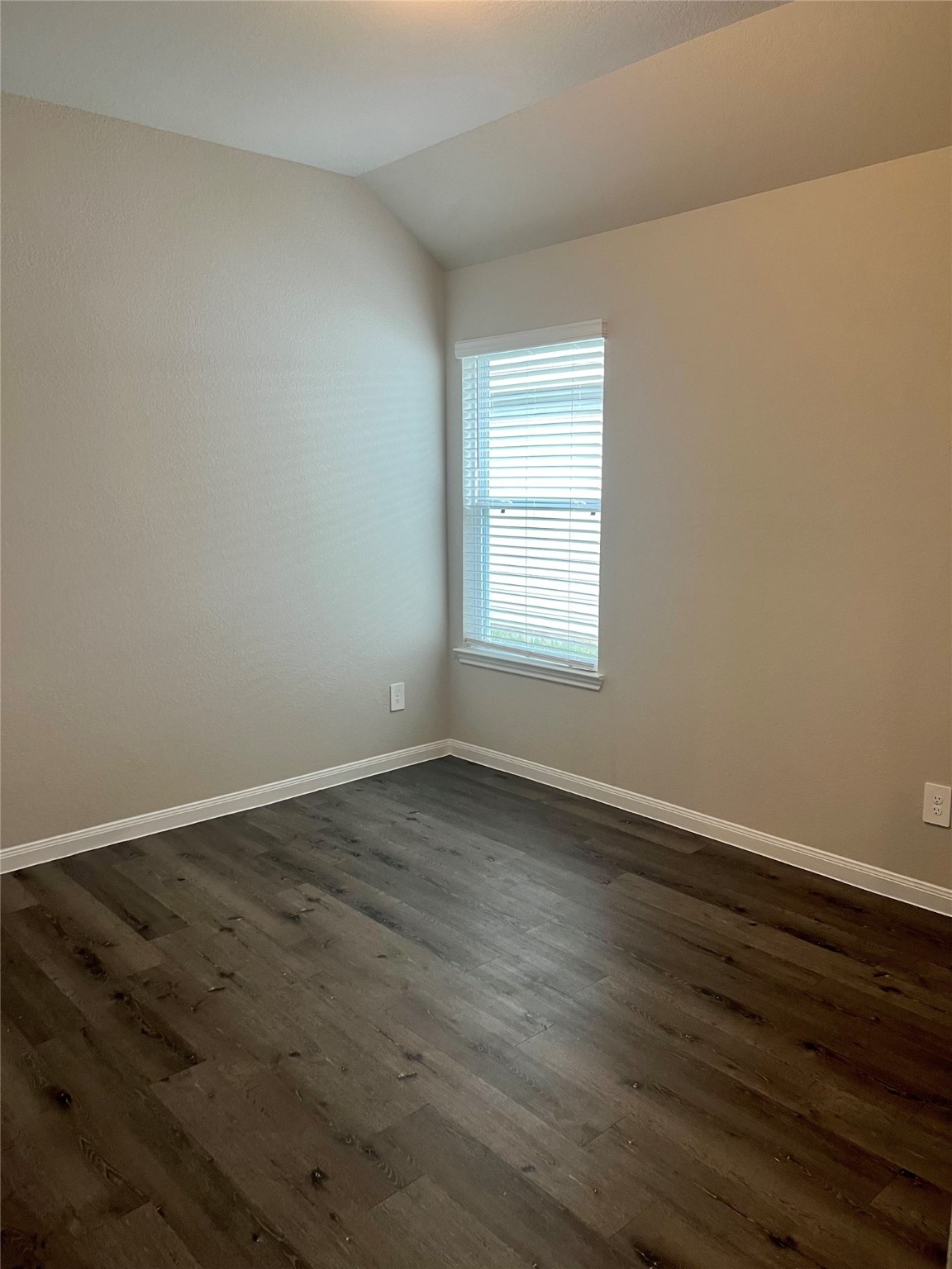 5603 Brooklyn Rose Drive Rosharon, TX 77583 - Photo 11 of 11 an empty room with wooden floor and window