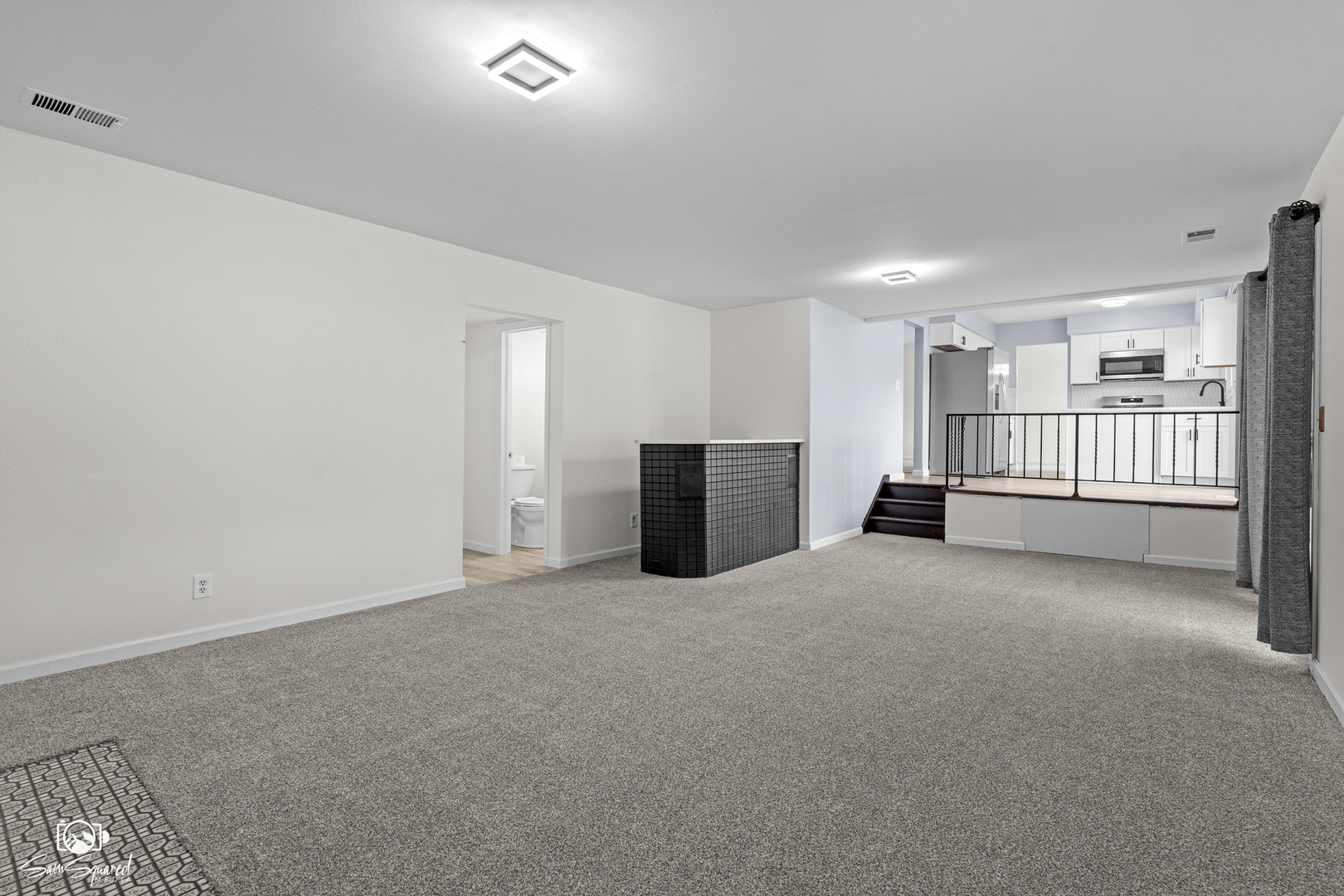 118 Camelot Way Bolingbrook, IL 60440 - Photo 14 of 32 a view of a livingroom with a staircase