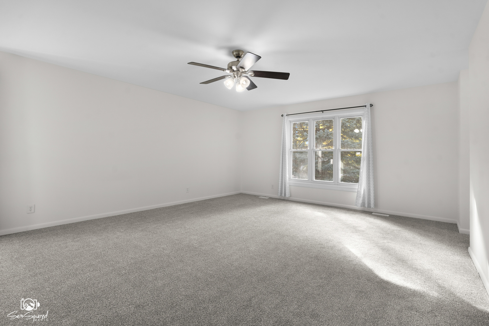 118 Camelot Way Bolingbrook, IL 60440 - Photo 18 of 32 an empty room with windows and fan