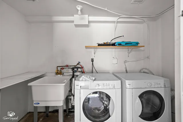 a utility room with dryer and washer