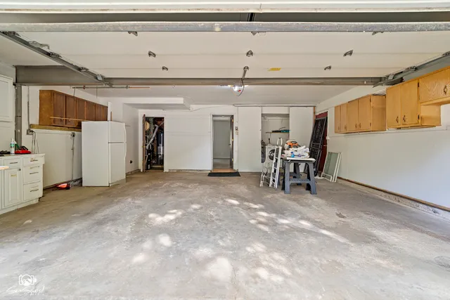 a view of a hallway with seating area