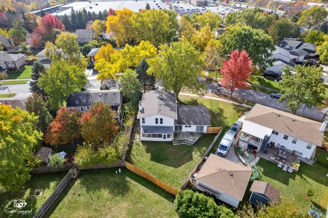 aerial view of a house with a swimming pool