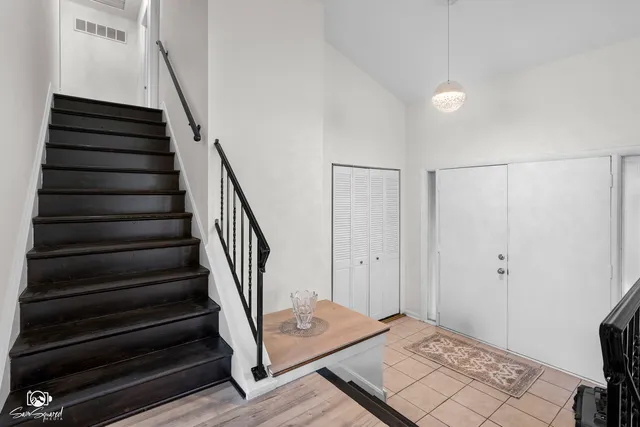 a view of a hallway view with staircase