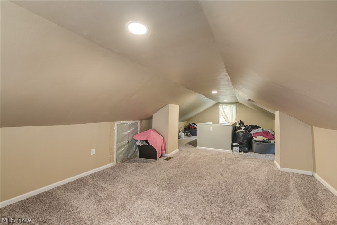 3735 Highland Road Cleveland, OH 44111 - Photo 28 of 35 Rec room featuring vaulted ceiling and carpet floors