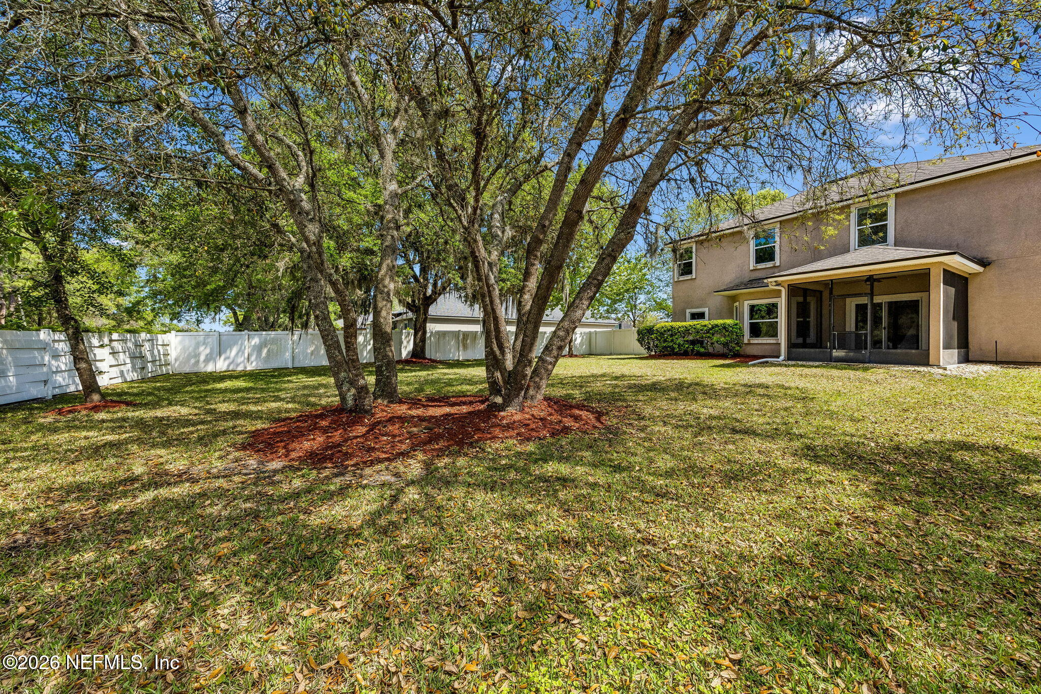 12198 Ridge Crossing Way Jacksonville, FL 32226 - Photo 47 of 67 a view of a house with a yard