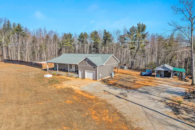 a view of a house with a big yard