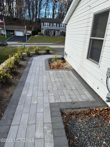 a view of a patio with furniture