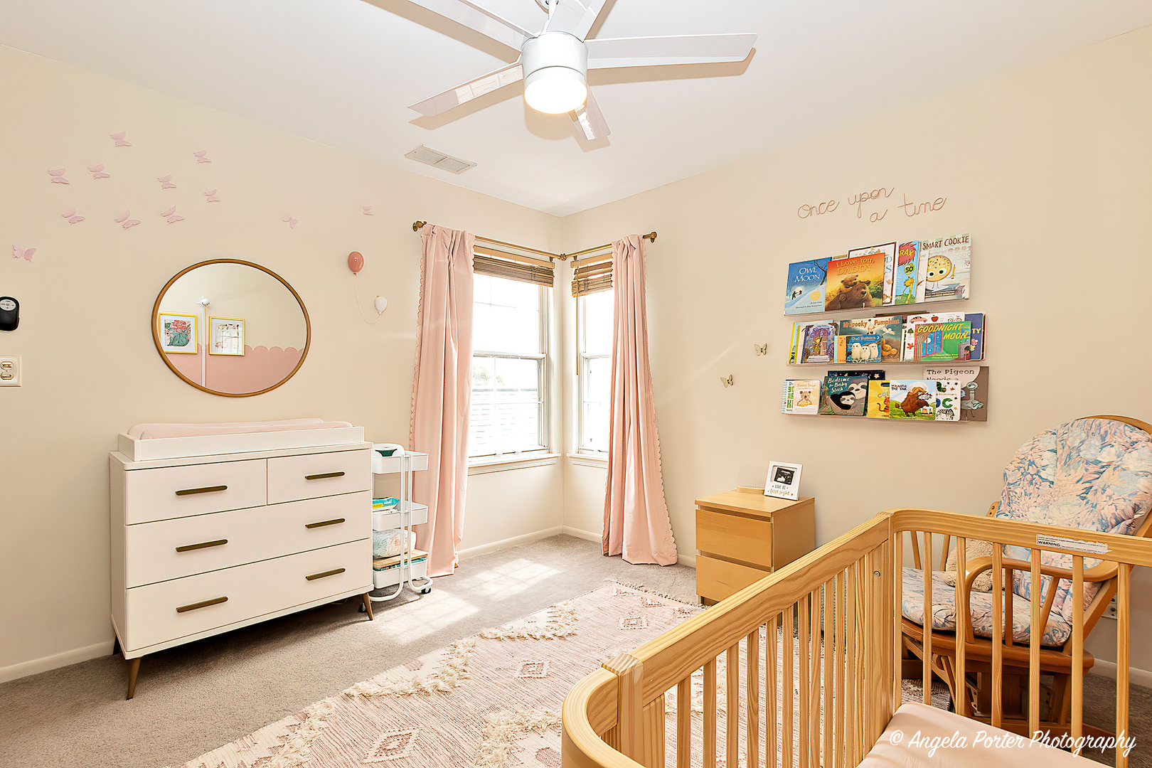 17838 Braewick Road, Unit 16017 Gurnee, IL 60031 - Photo 18 of 28 a view of a hallway with windows