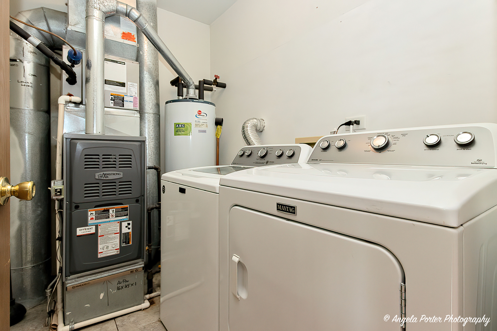 17838 Braewick Road, Unit 16017 Gurnee, IL 60031 - Photo 25 of 28 a utility room with dryer and washer