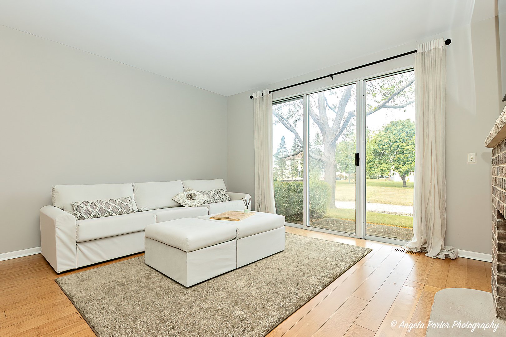 17838 Braewick Road, Unit 16017 Gurnee, IL 60031 - Photo 5 of 28 a living room with furniture and a large window