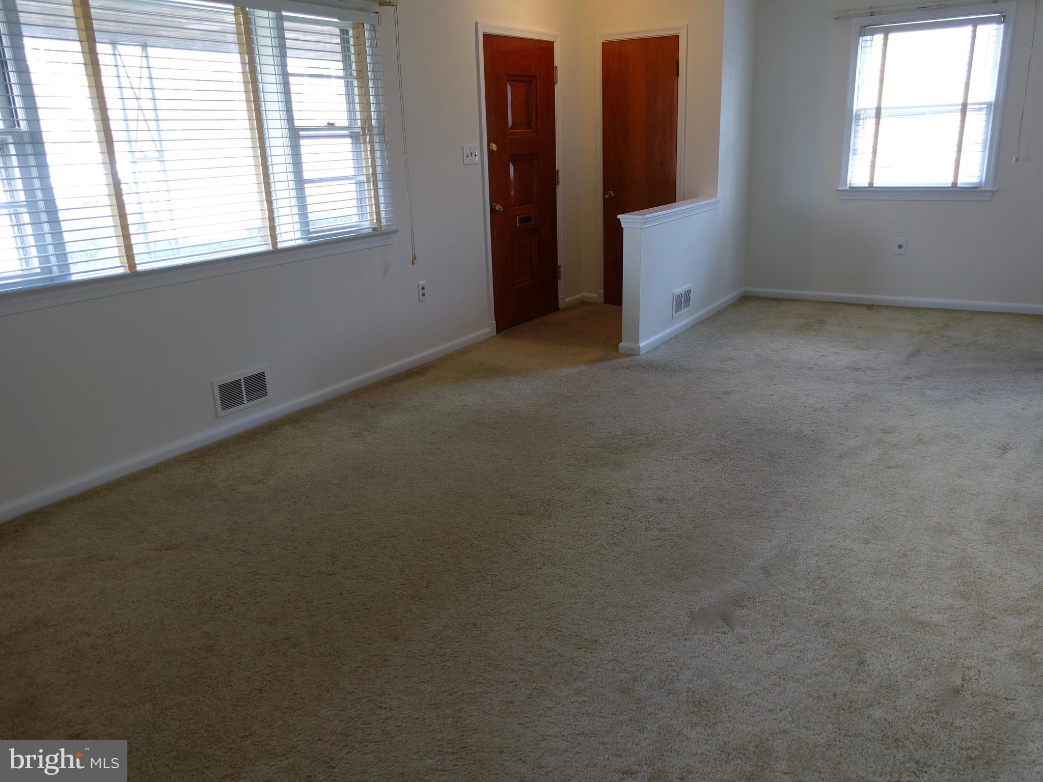 2619 Higbee Road Adelphi, MD 20783 - Photo 3 of 12 an empty room with windows