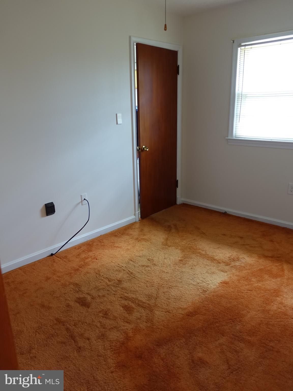 2619 Higbee Road Adelphi, MD 20783 - Photo 8 of 12 an empty room with windows