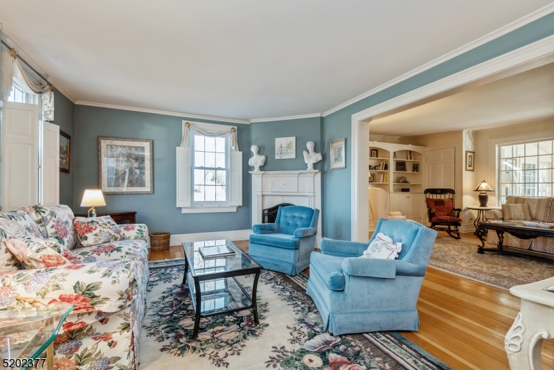 6 Hanover Road Florham Park, NJ 07932 - Photo 4 of 26 a living room with furniture and a fireplace