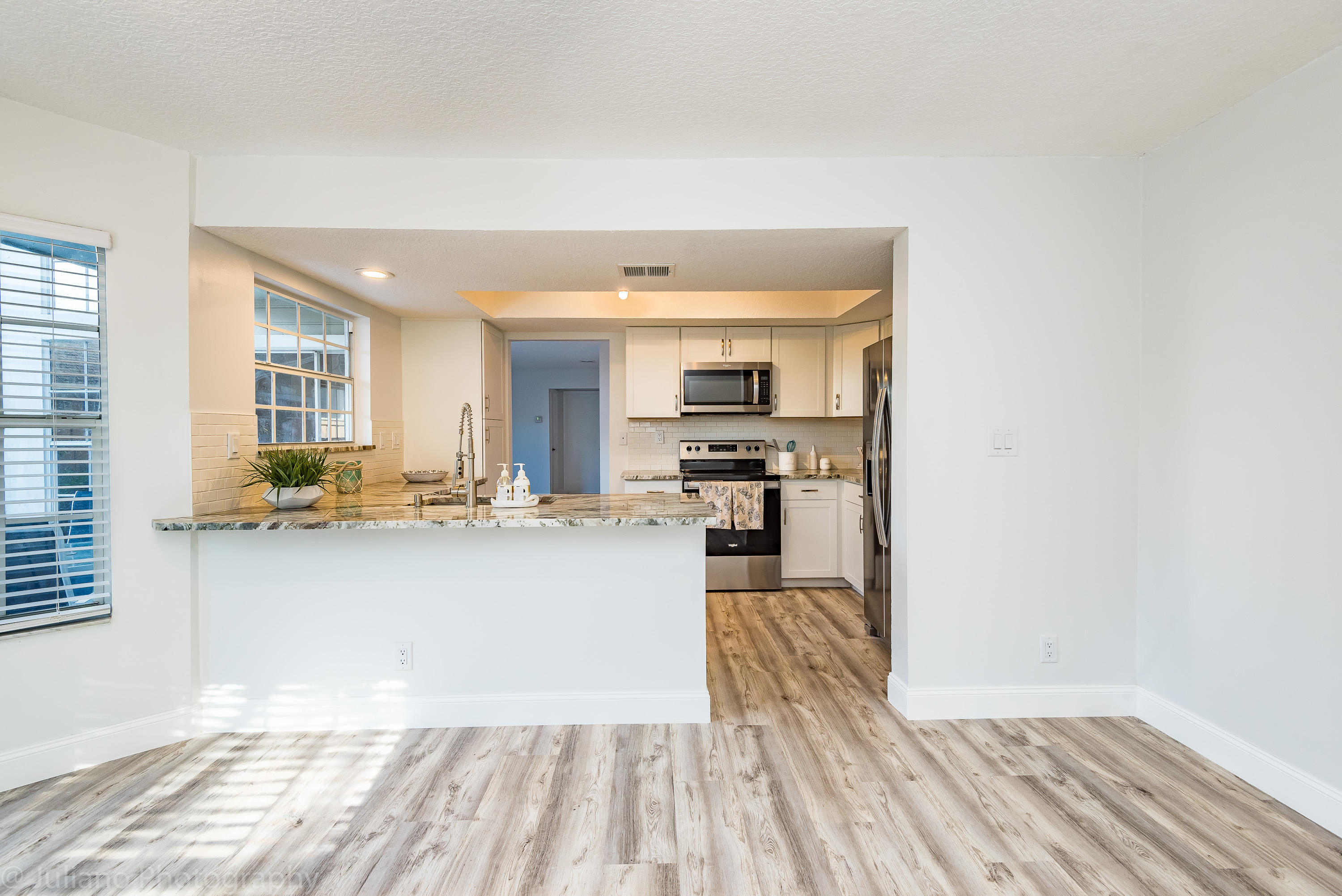 5080 Point Alexis Boca Raton, FL 33431 - Photo 8 of 31 Kitchen/Den