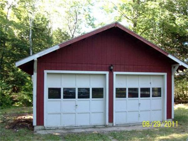 35 Lower Lake Road Ashburnham, MA 01430 - Photo 3 of 7 a front view of a house with a yard
