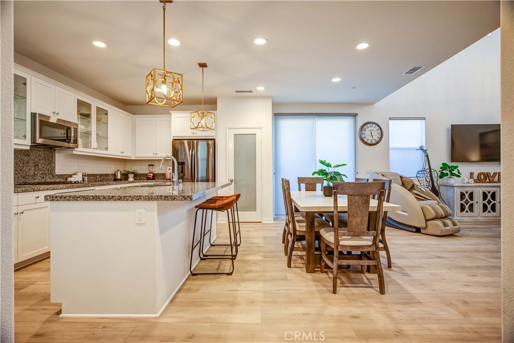 a view of a dining room with furniture