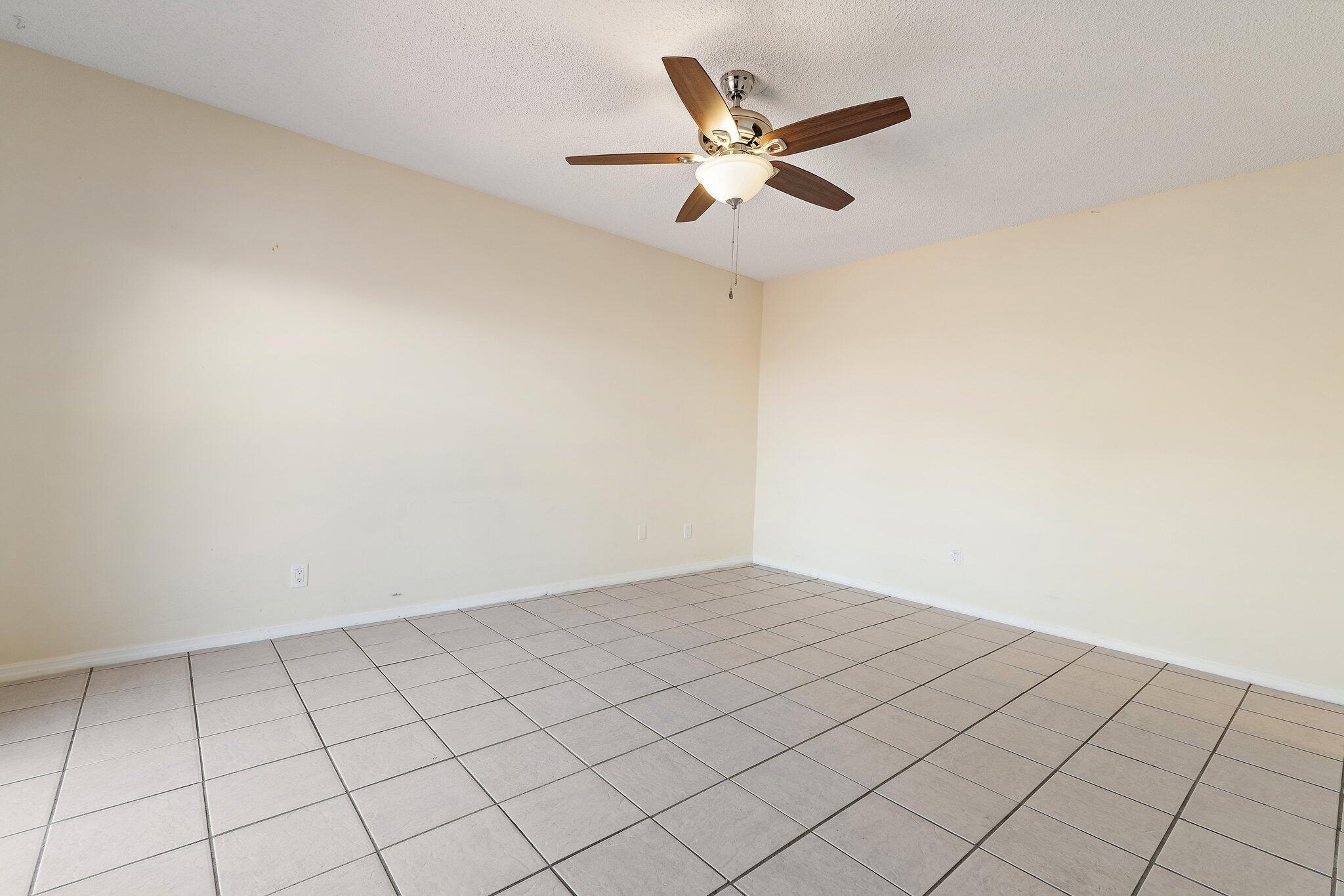 3581 Southeast Cobia Way Stuart, FL 34997 - Photo 14 of 26 an empty room
