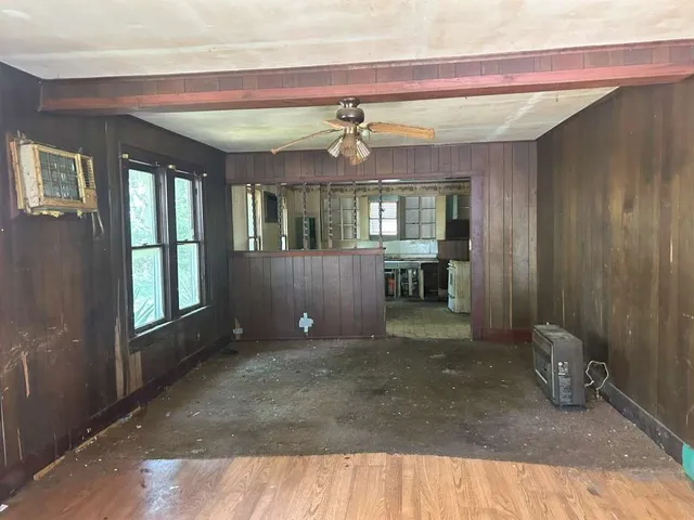 a view of an empty room and window