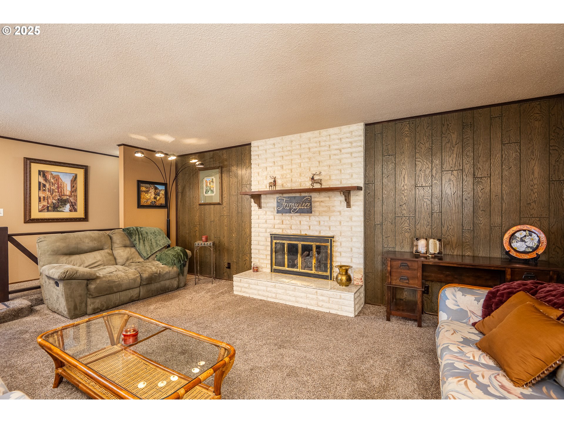2121 Firth Avenue Springfield, OR 97477 - Photo 11 of 40 a living room with furniture and a fireplace