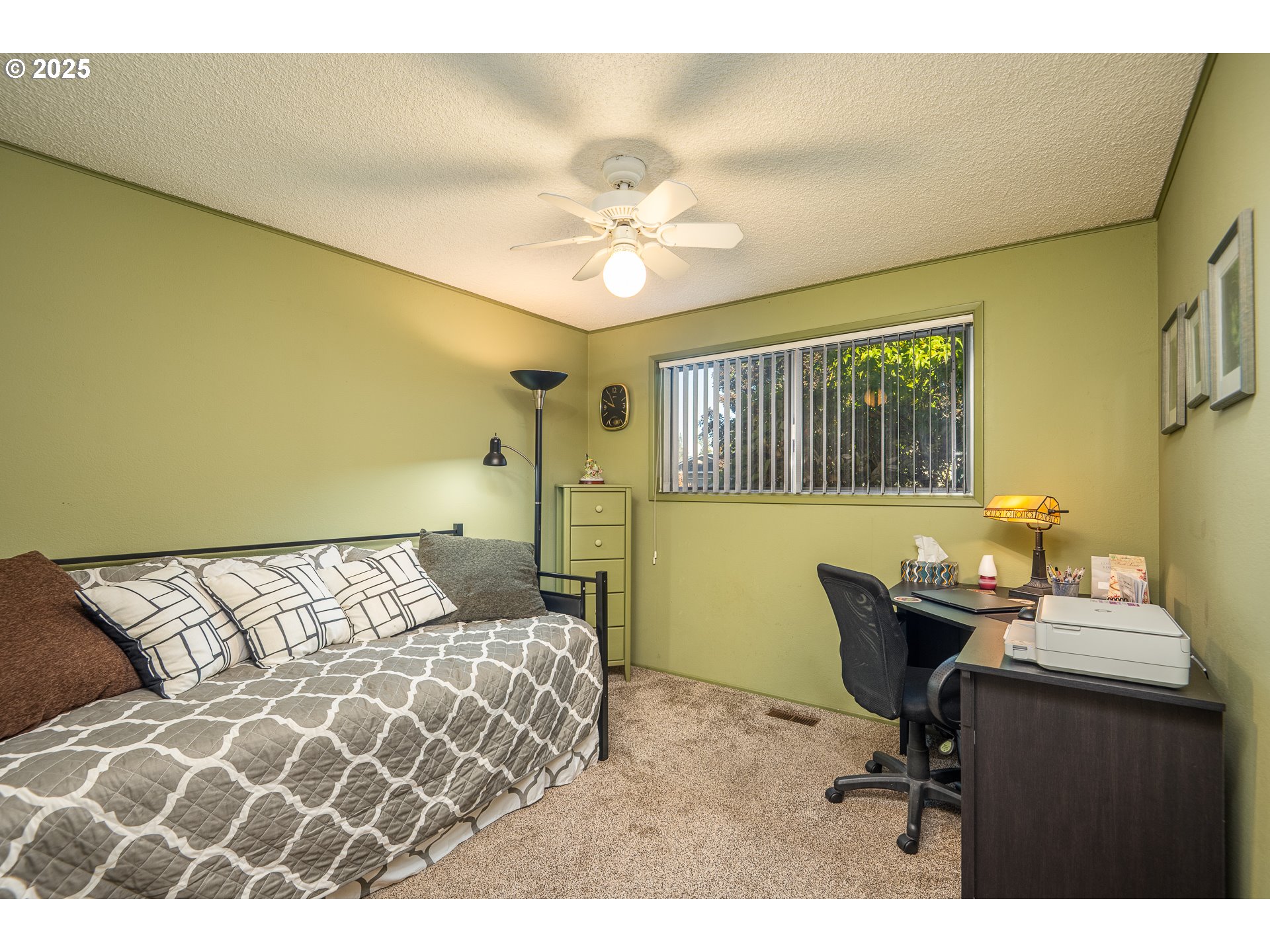 2121 Firth Avenue Springfield, OR 97477 - Photo 29 of 40 a bedroom with a bed and a table