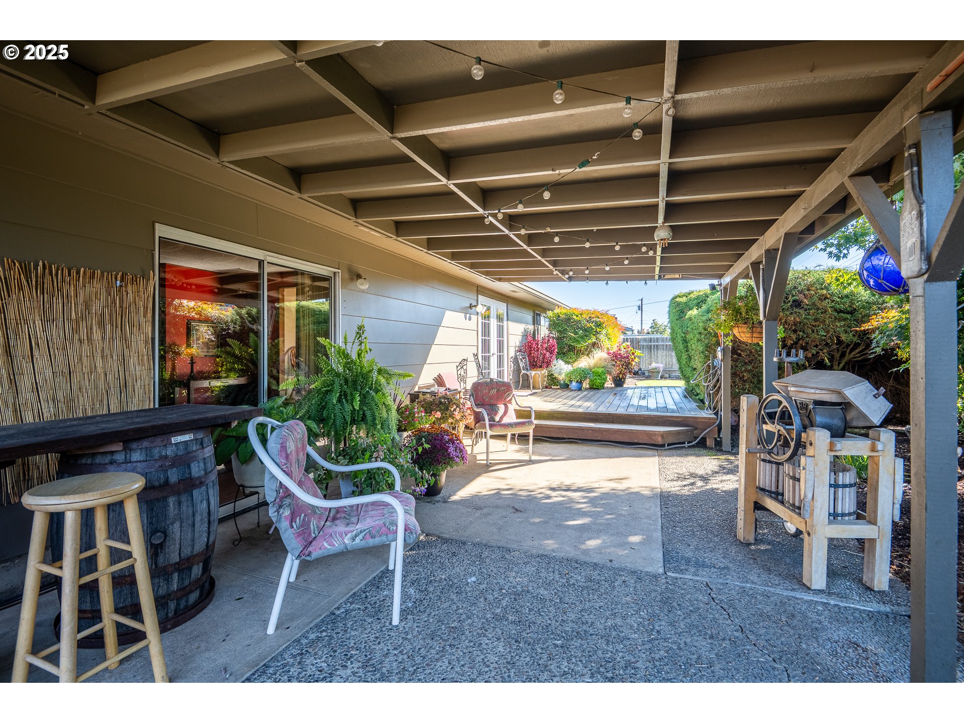2121 Firth Avenue Springfield, OR 97477 - Photo 37 of 40 a view of a porch with furniture and a grill