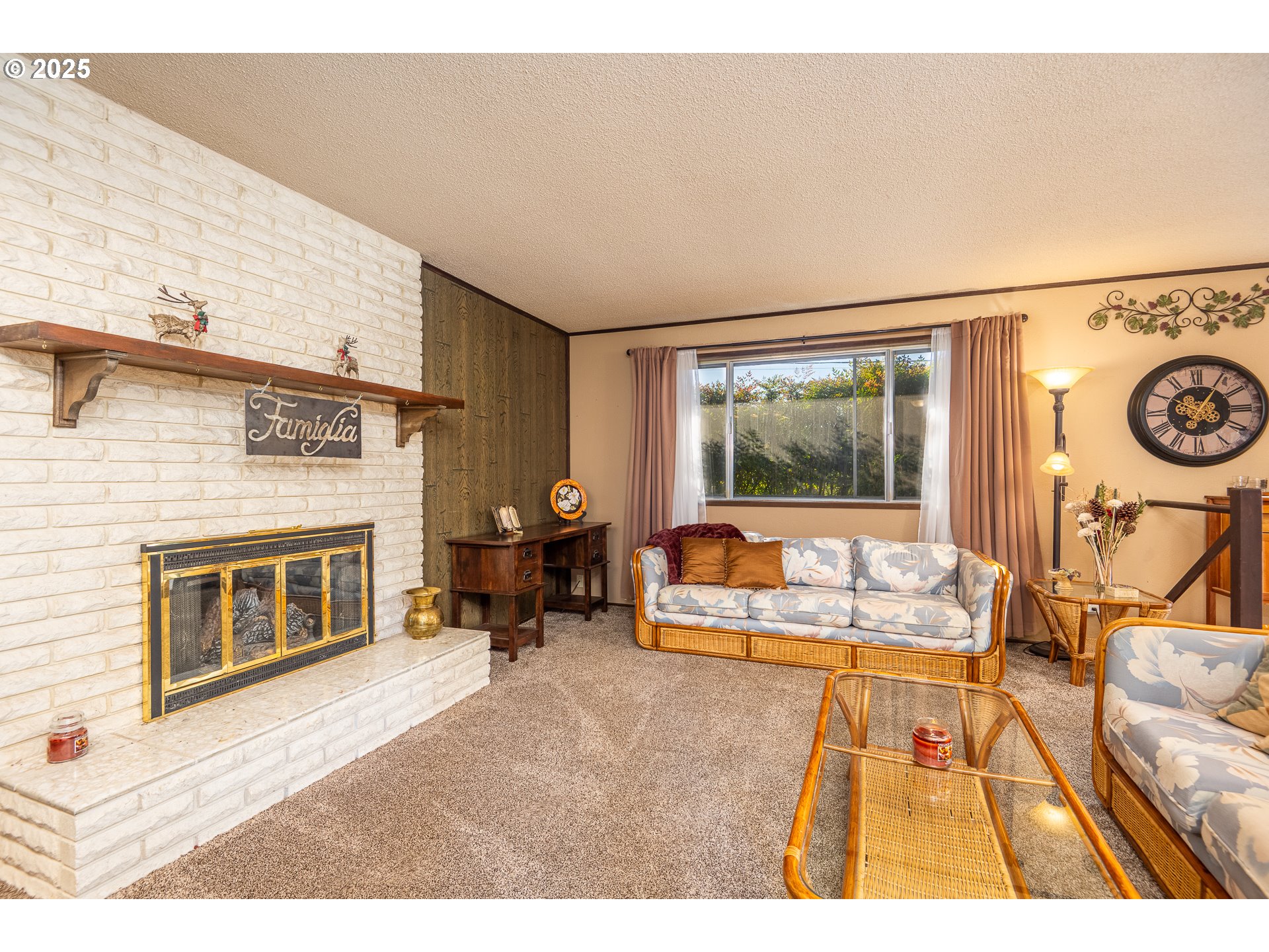2121 Firth Avenue Springfield, OR 97477 - Photo 9 of 40 a living room with furniture and a fireplace