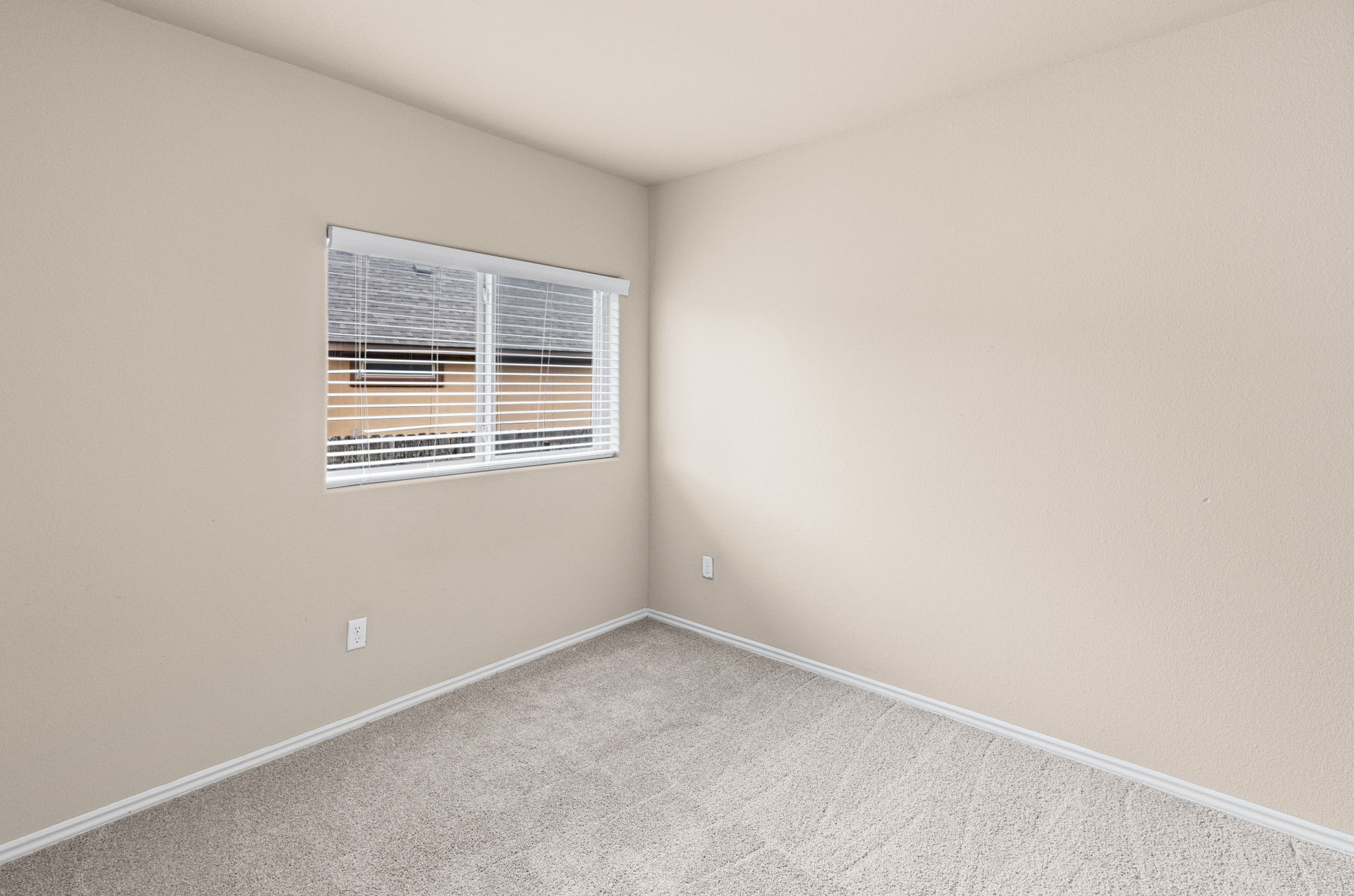 19308 Stokes Lane Pflugerville, TX 78660 - Photo 17 of 27 a view of an empty room with a window