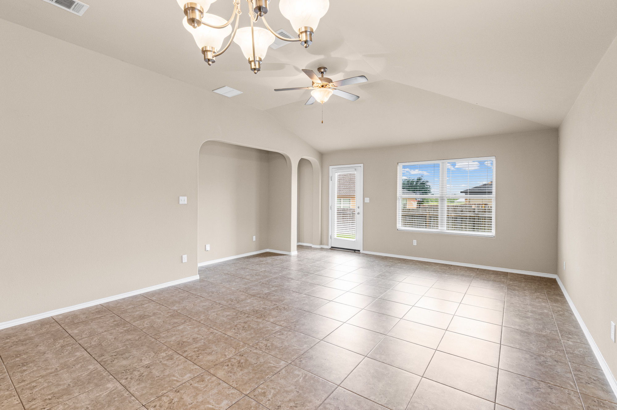 19308 Stokes Lane Pflugerville, TX 78660 - Photo 2 of 27 a view of an empty room with a window