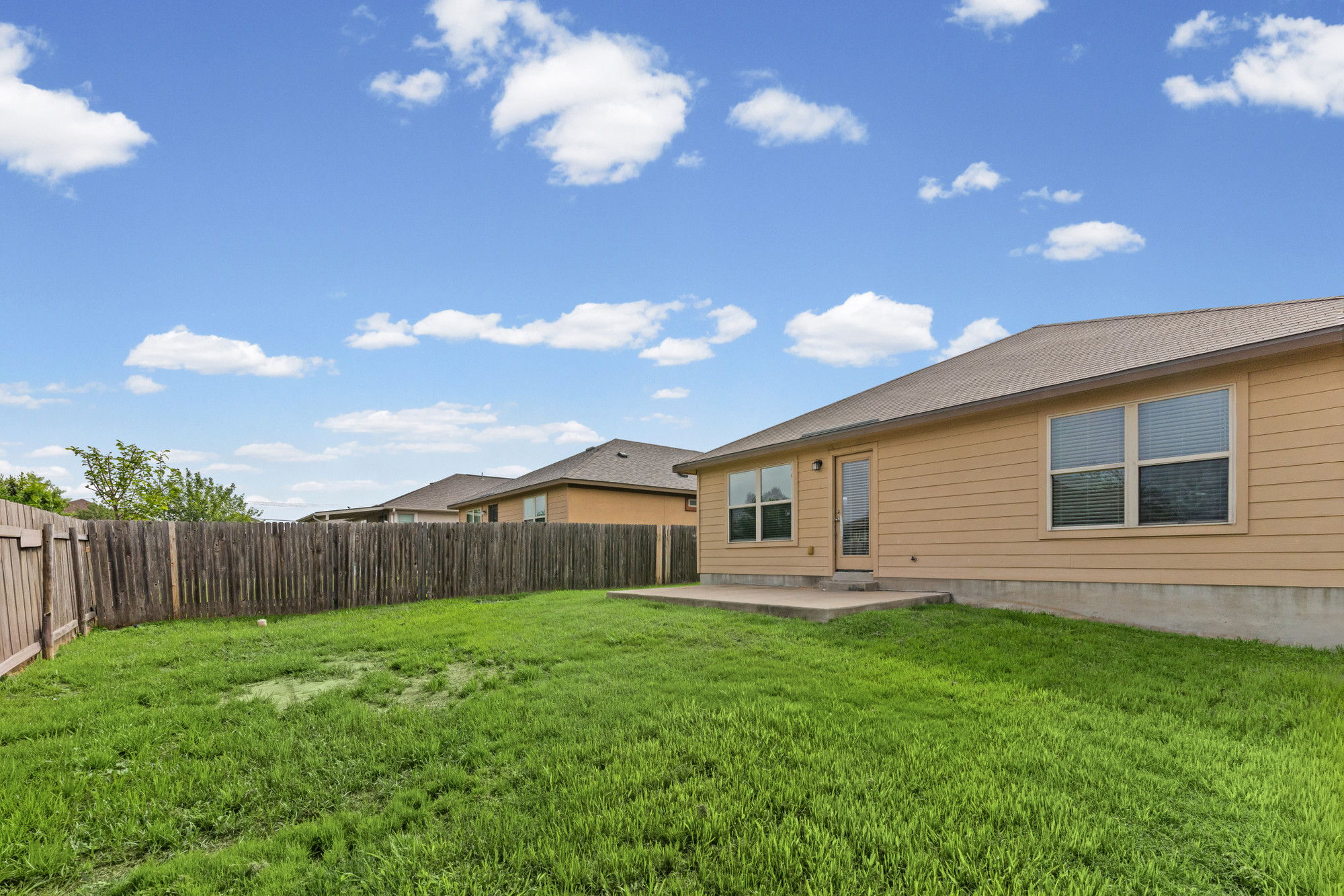 19308 Stokes Lane Pflugerville, TX 78660 - Photo 25 of 27 a front view of house with yard and green space