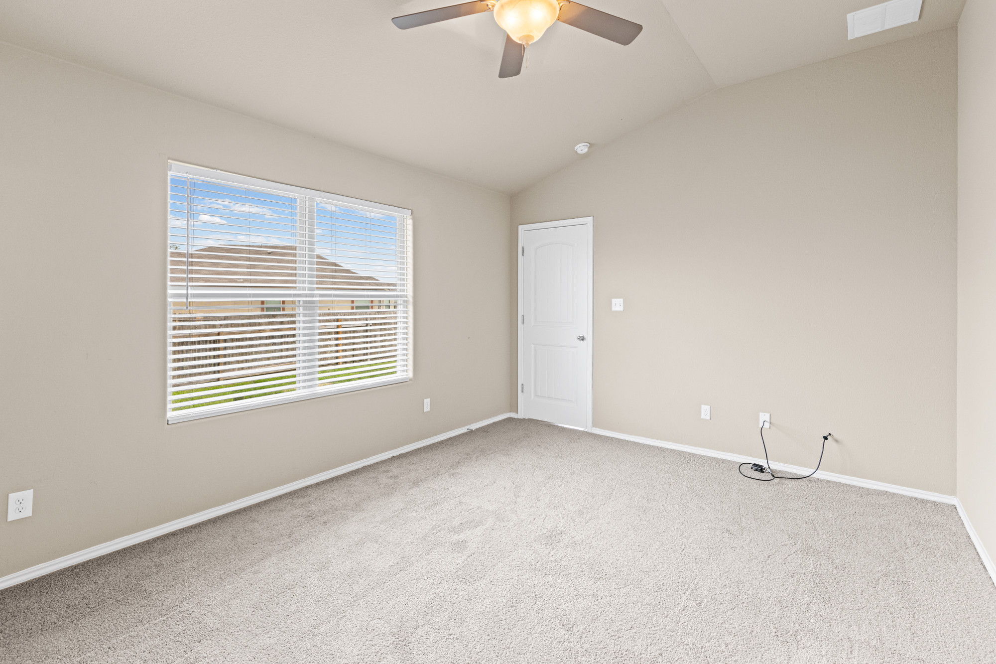 19308 Stokes Lane Pflugerville, TX 78660 - Photo 10 of 27 a view of an empty room with a window