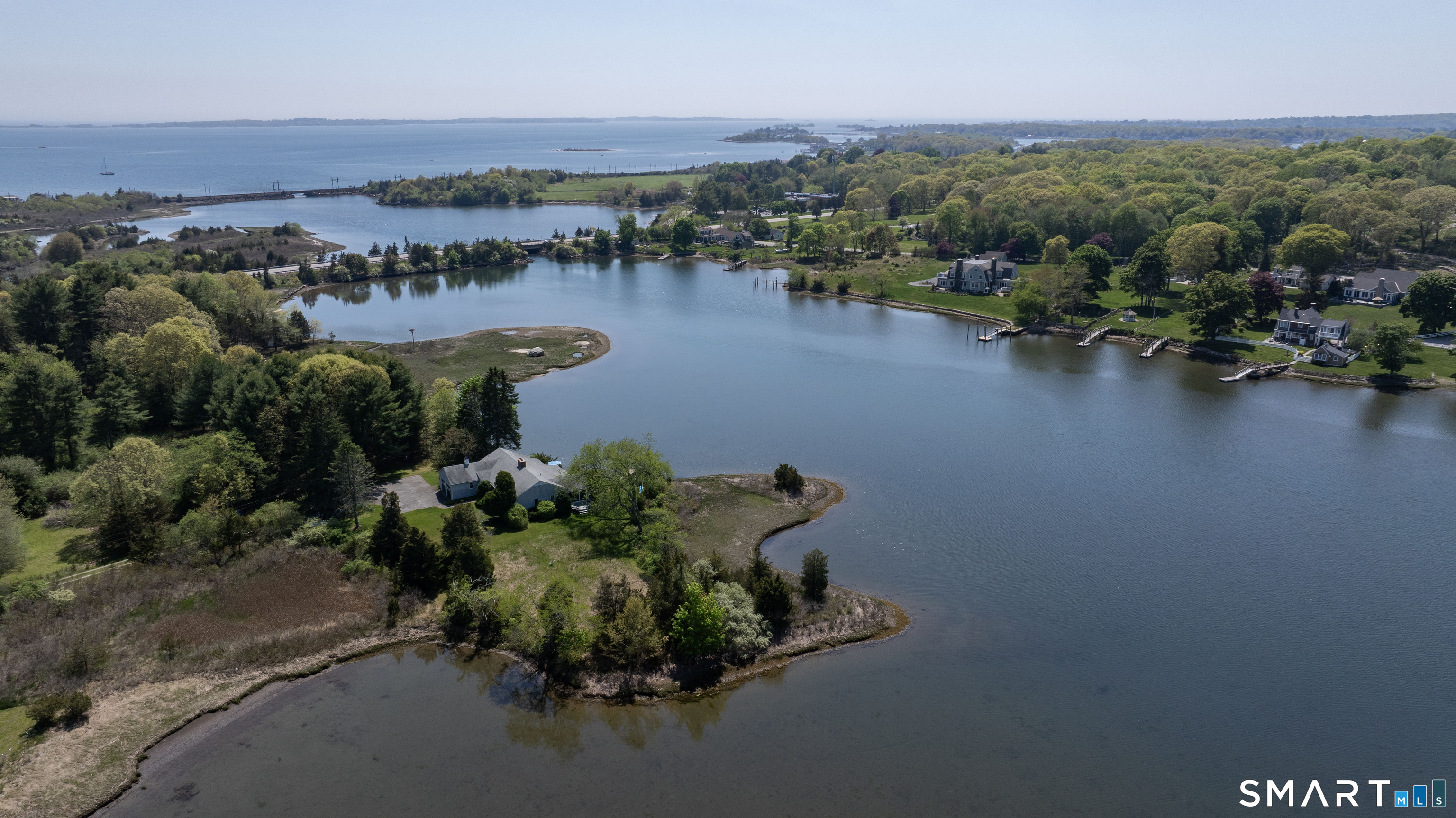 27 Wilbur Road Stonington, CT 06378 - Photo 36 of 40 an aerial view of a house with a lake view