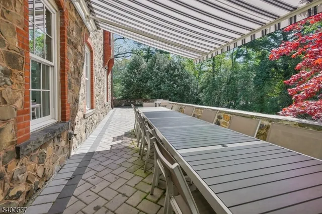 a bedroom with a bed and a desk