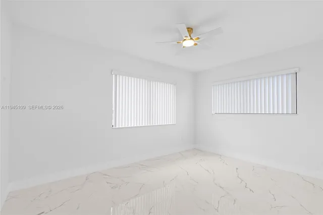 wooden floor in a room with a window